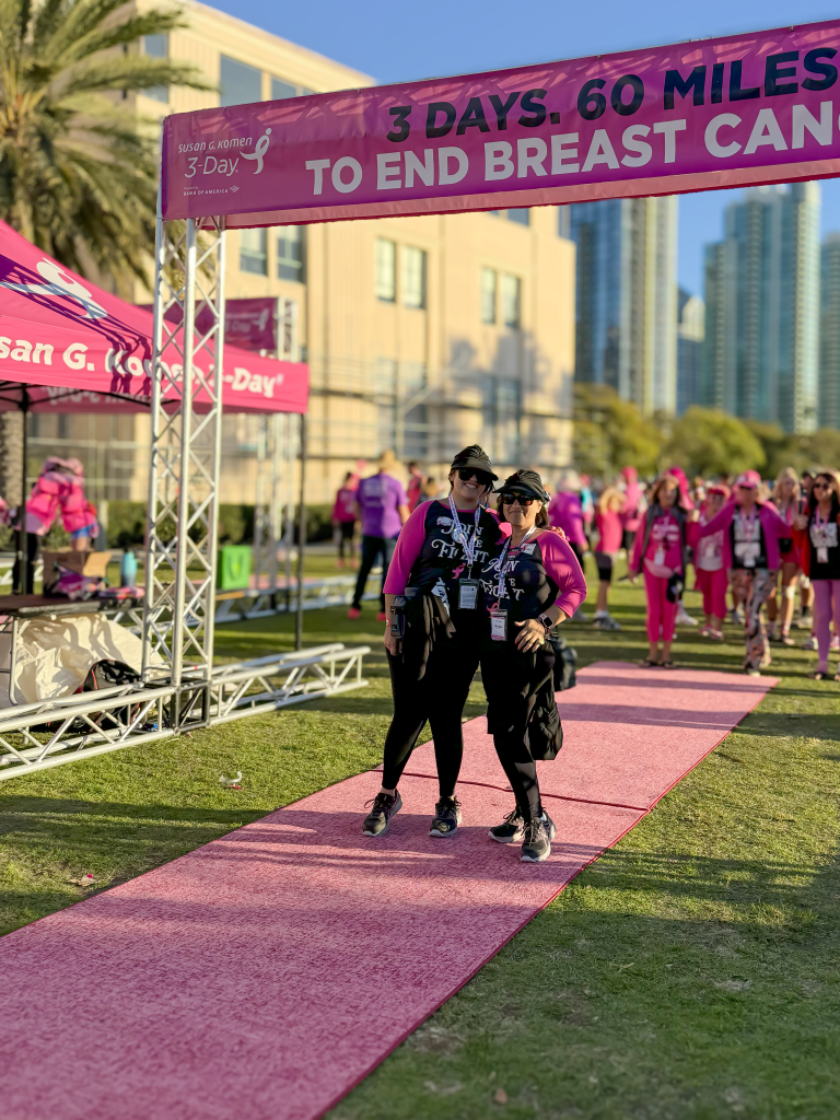 Teresa and Stephania stand at the finish line of the San Diego 3-Day Walk